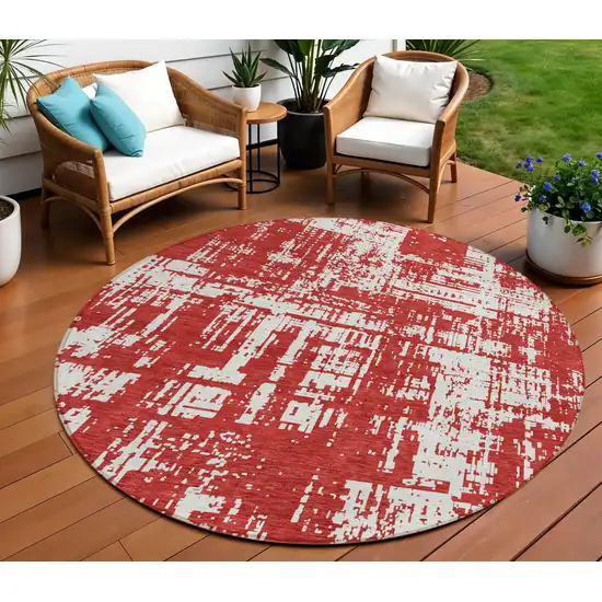8' Red And Ivory Round Abstract Washable Indoor Outdoor Area Rug Photo 1