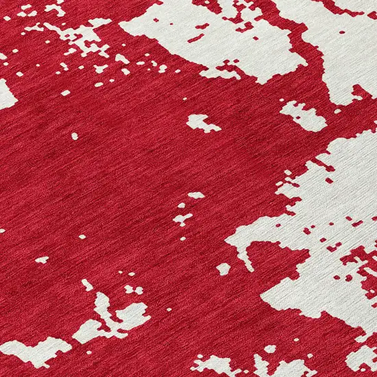8' Red And Ivory Round Abstract Washable Indoor Outdoor Area Rug Photo 8