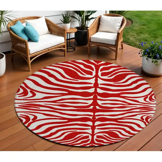 8' Red And Ivory Round Animal Print Washable Indoor Outdoor Area Rug Photo 1