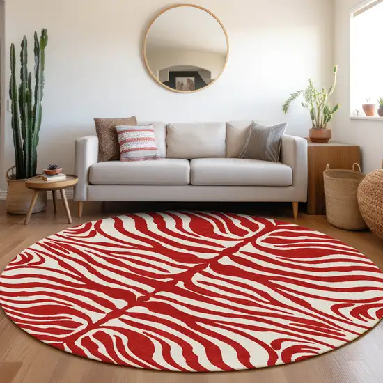 8' Red And Ivory Round Animal Print Washable Indoor Outdoor Area Rug Photo 8