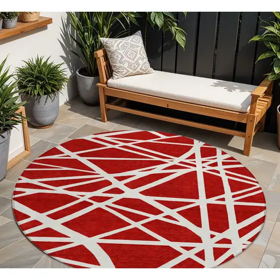 8' Red And Ivory Round Geometric Washable Indoor Outdoor Area Rug Photo 1