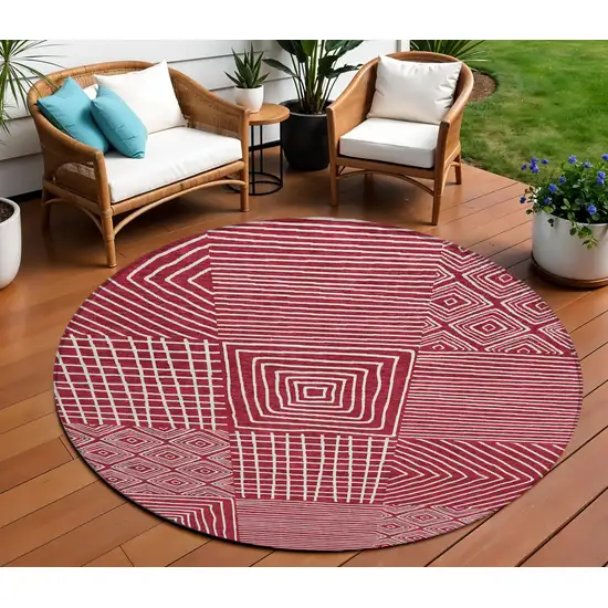 8' Red And Ivory Round Geometric Washable Indoor Outdoor Area Rug Photo 1