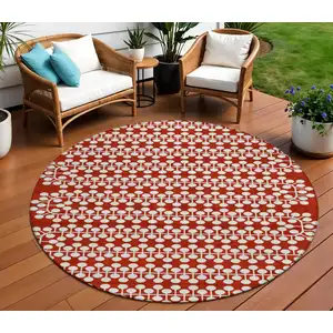 Photo of 8' Red And Ivory Round Geometric Washable Indoor Outdoor Area Rug