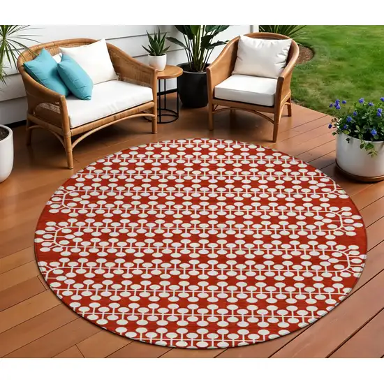 8' Red And Ivory Round Geometric Washable Indoor Outdoor Area Rug Photo 1