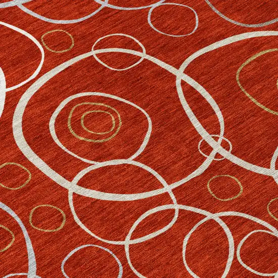 8' Red And Ivory Round Geometric Washable Indoor Outdoor Area Rug Photo 9