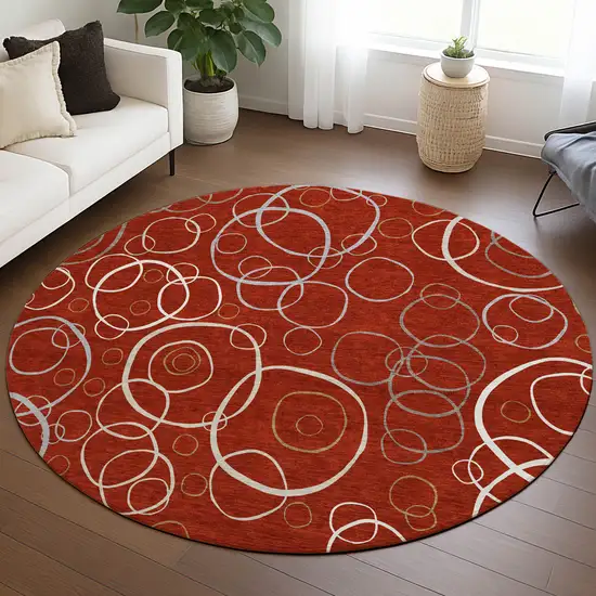 8' Red And Ivory Round Geometric Washable Indoor Outdoor Area Rug Photo 5