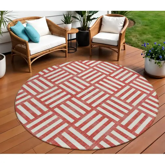 8' Red And Ivory Round Geometric Washable Indoor Outdoor Area Rug Photo 1