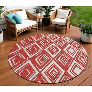 Photo of 8' Red And Ivory Round Geometric Washable Indoor Outdoor Area Rug