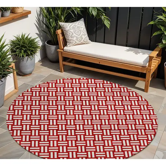 8' Red And Ivory Round Geometric Washable Indoor Outdoor Area Rug Photo 1