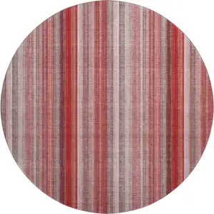 Photo of 8' Red And Ivory Striped Washable Round Rug With UV Protection