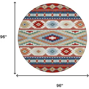Photo of 8' Red And Navy Blue Round Southwestern Washable Indoor Outdoor Area Rug