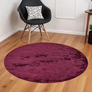 Photo of 8' Red And Purple Round Shag Tufted Handmade Area Rug
