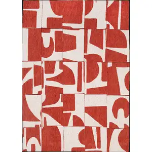 Photo of 10' Red And White Geometric Washable Runner Rug