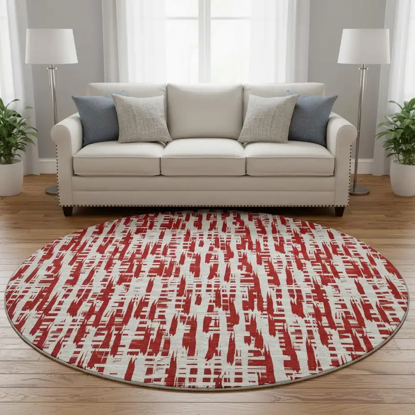 8' Red Beige And Ivory Abstract Geometric Washable Round Rug With UV Protection Photo 2