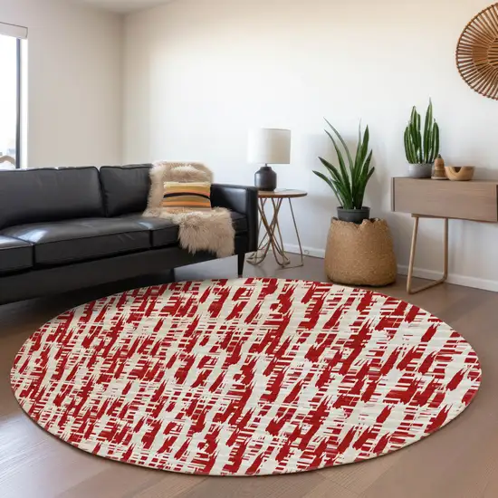 8' Red Beige And Ivory Abstract Geometric Washable Round Rug With UV Protection Photo 3