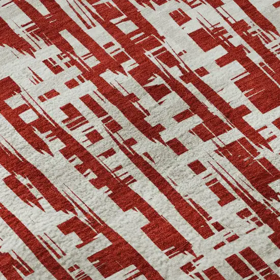 8' Red Beige And Ivory Abstract Geometric Washable Round Rug With UV Protection Photo 7