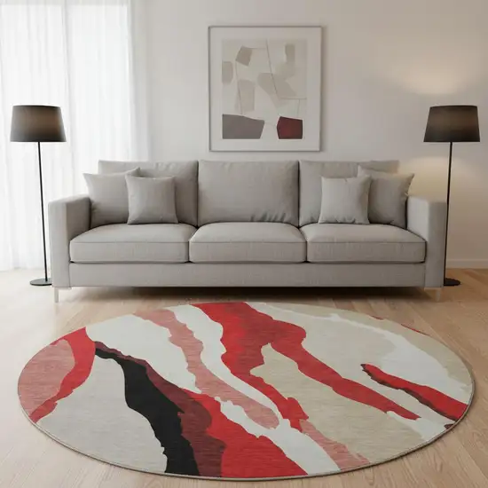 8' Red Black And Ivory Abstract Washable Round Rug With UV Protection Photo 2