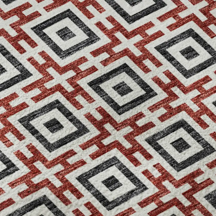 8' Red Black And Ivory Geometric Washable Round Rug With UV Protection Photo 9