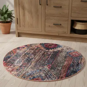Photo of 4' Red Geometric Power Loom Worn Faded Round Rug