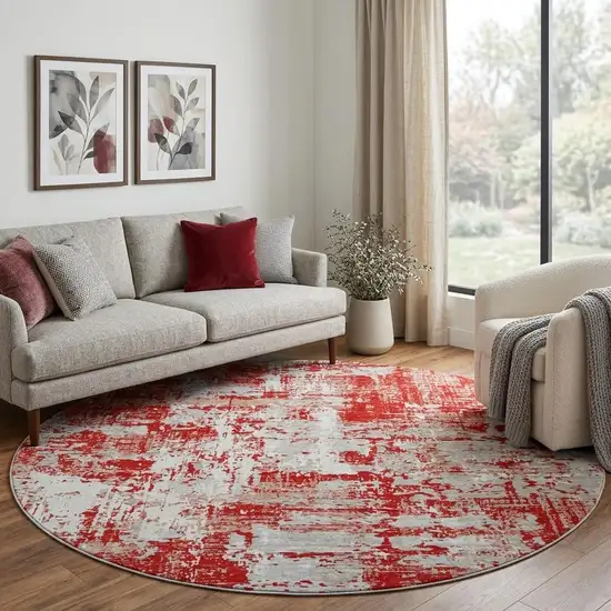 8' Red Gray And Ivory Abstract Washable Round Rug With UV Protection Photo 1