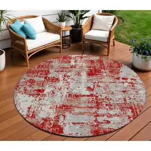 Photo of 8' Red Gray And Ivory Round Abstract Washable Indoor Outdoor Area Rug