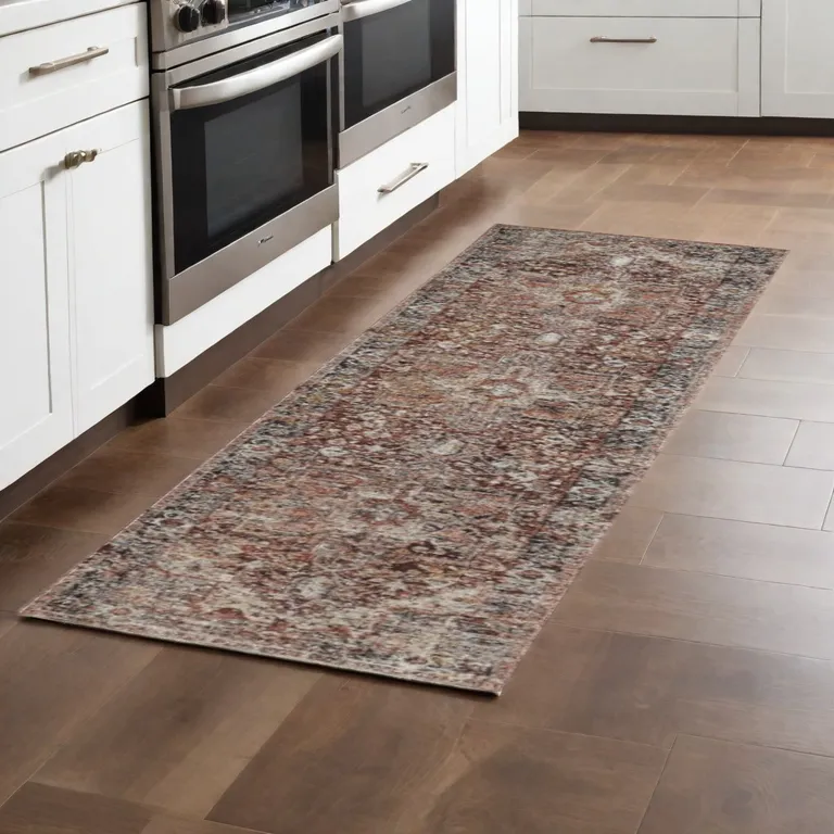 10' Red Ivory And Black Abstract Distressed Runner Rug With Fringe Photo 3