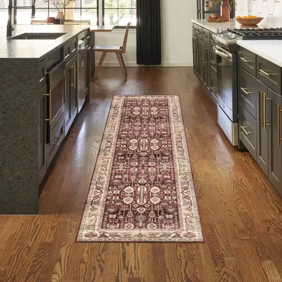 8' Red and Ivory Oriental Distressed Non Skid Runner Rug Photo 9