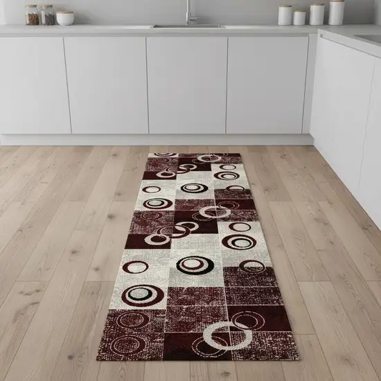 8' Red and White Geometric Power Loom Runner Rug Photo 1