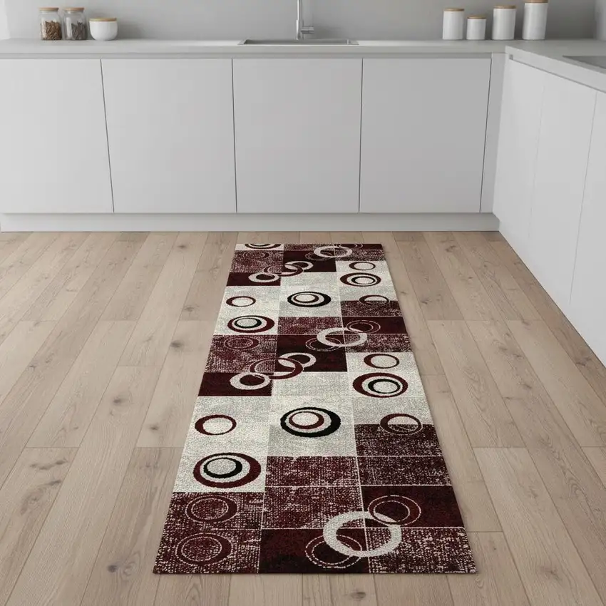 8' Red and White Geometric Power Loom Runner Rug Photo 1