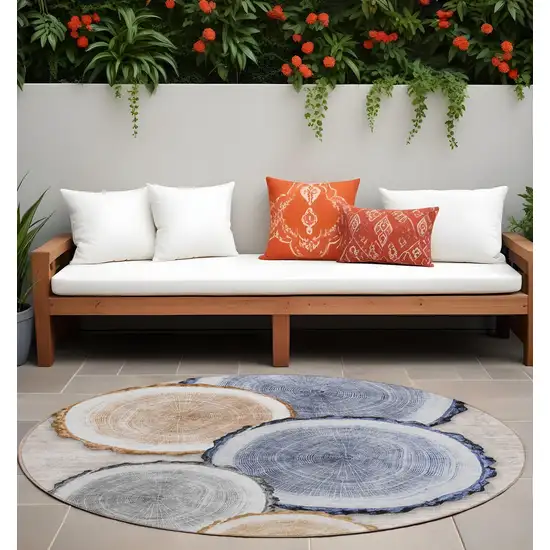 Beige Blue and Gold Round Faux Bois Washable Non Skid Indoor Outdoor Area Rug Photo 1