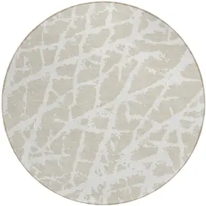 Photo of 8' Round Beige and Ivory Round Abstract Washable Non Skid Indoor Outdoor Area Rug