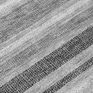 Photo of 8' Round Black Silver and Gray Round Striped Washable Non Skid Indoor Outdoor Area Rug