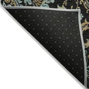 Photo of 8' Round Black and Gold Round Paisley Washable Non Skid Indoor Outdoor Area Rug