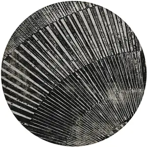 Photo of 8' Round Black and Ivory Round Abstract Washable Non Skid Indoor Outdoor Area Rug