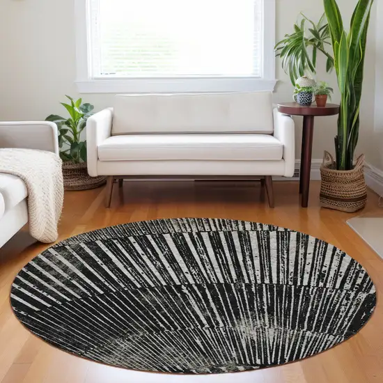 Black and Ivory Round Abstract Washable Non Skid Indoor Outdoor Area Rug Photo 9