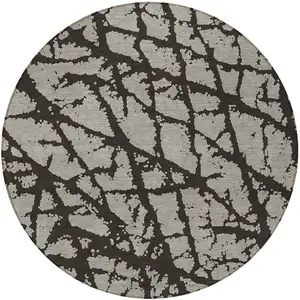 Photo of 8' Round Black and White Round Abstract Washable Non Skid Indoor Outdoor Area Rug