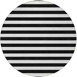Photo of 8' Round Black and White Round Striped Washable Non Skid Indoor Outdoor Area Rug