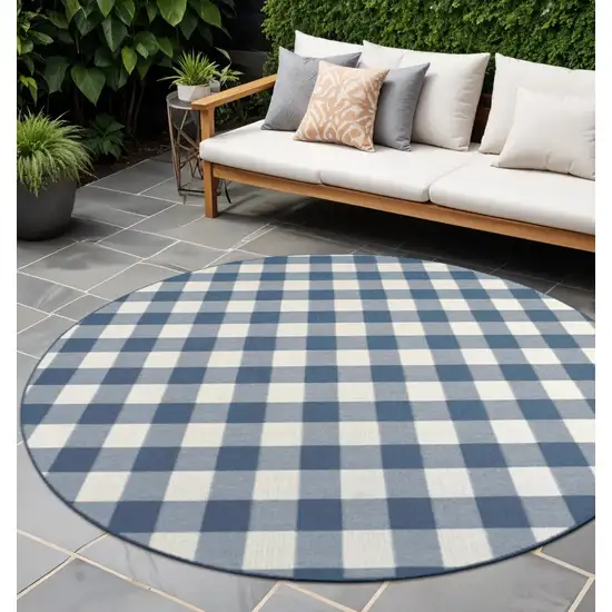 Blue and Ivory Round Geometric Stain Resistant Indoor Outdoor Area Rug Photo 1