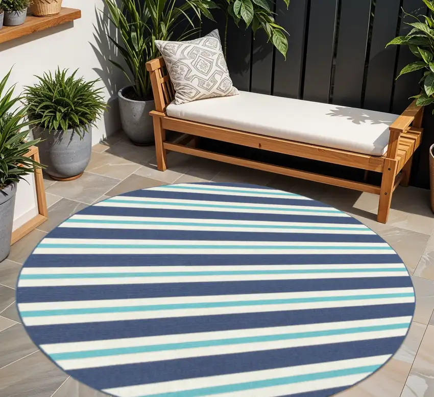 Blue and Ivory Round Geometric Stain Resistant Indoor Outdoor Area Rug Photo 1