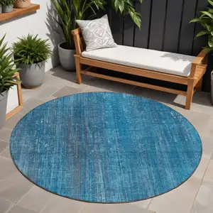 Photo of 8' Round Blue Round Striped Washable Non Skid Indoor Outdoor Area Rug
