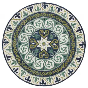 Photo of 5' Round Blue and Green Ornate Medallion Area Rug