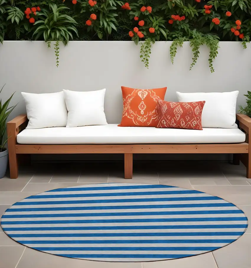 8' Round Blue and Ivory Round Striped Washable Non Skid Indoor Outdoor Area Rug Photo 1