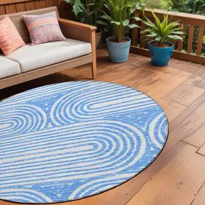 Photo of 8' Round Blue and White Round Abstract Washable Non Skid Indoor Outdoor Area Rug