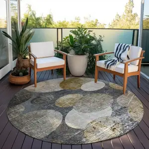 Photo of 8' Round Brown Beige and Ivory Round Abstract Washable Non Skid Indoor Outdoor Area Rug