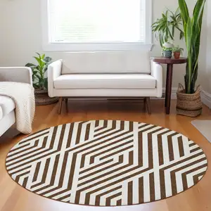 Photo of 8' Round Brown and White Round Geometric Washable Non Skid Indoor Outdoor Area Rug