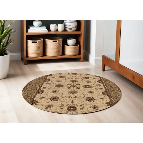 5' Beige and Ivory Round Oriental Power Loom Area Rug Photo 1