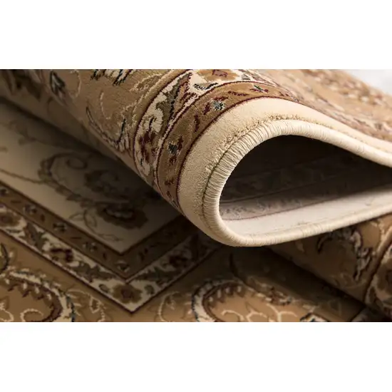 5' Beige and Ivory Round Oriental Power Loom Area Rug Photo 4