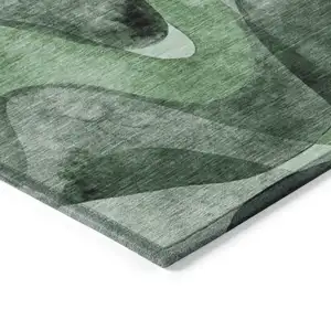 Photo of 8' Round Fern Green Round Abstract Washable Non Skid Indoor Outdoor Area Rug