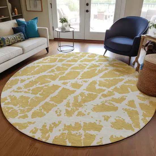 Gold and White Round Abstract Washable Non Skid Indoor Outdoor Area Rug Photo 9