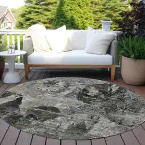 Photo of 8' Round Gray Dark Green and Black Round Floral Washable Non Skid Indoor Outdoor Area Rug